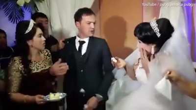 Husband slaps wife on their wedding day