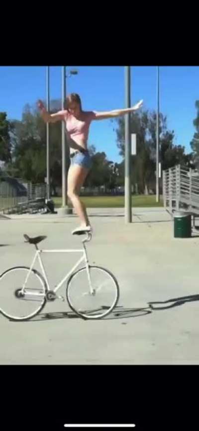 I could not find out who this person is. But if you know her, please leave a comment and give her credit. Insane balance!!
