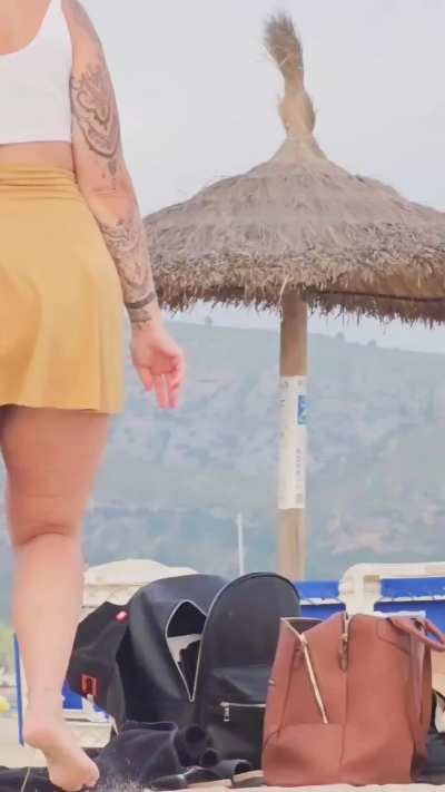 Upskirt pussy at the beach