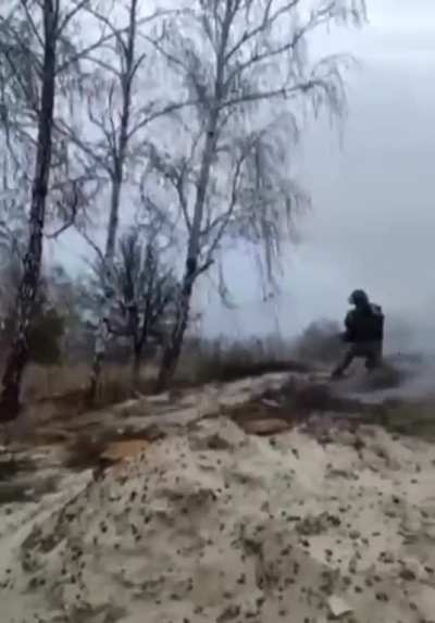 Ukrainian soldiers firing MANPADS at Russian helicopters landing at Hostomel airport on the first day of the war.