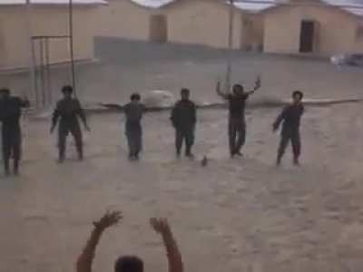 Afghan National Police performing jumping jacks on the direction of US military instructors, 2012