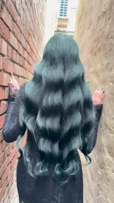 Have you seen long dark green hair before?