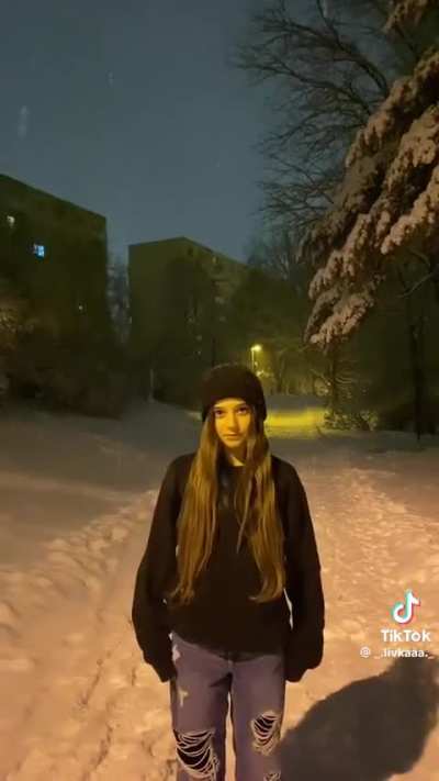 Teen girl feet in snow