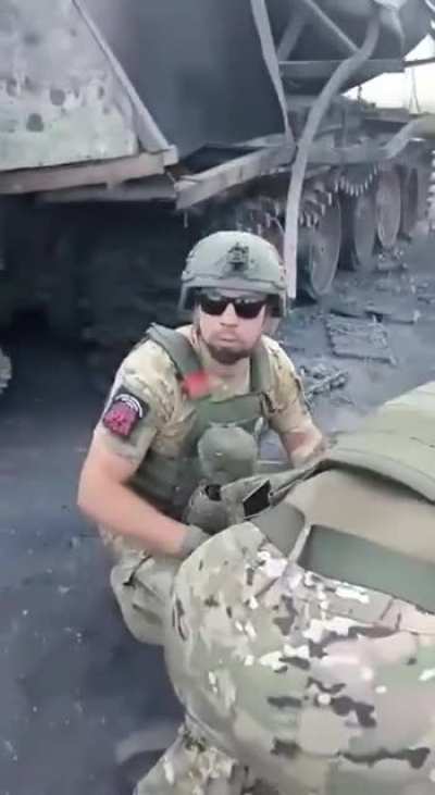 RU POV: Russian field medics evacuation of a lone survivor from a "Turtle Tank" like vehicle destroyed during an attack. 