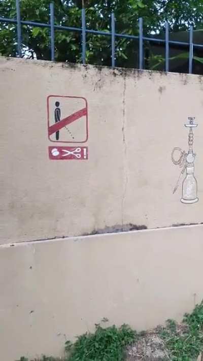 Frightening warning in a Sri Lankan village. I hope this is a joke. I didn't check it out.