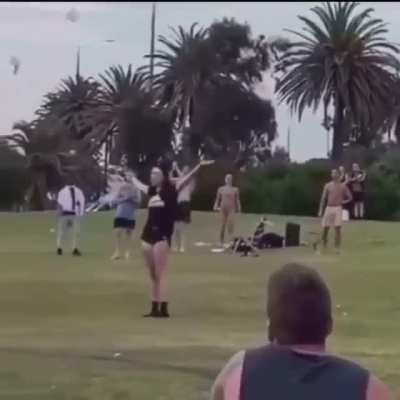 An Officer spartan kicks woman then proceeds to spray silly string on two women