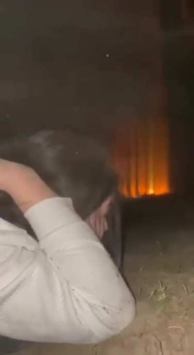 Moment a Russian Shahed drone hits Kharkiv, Ukraine. Civilians drop for cover