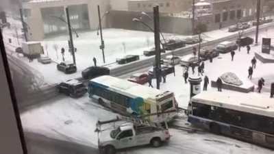 Driving down a hill in the snow