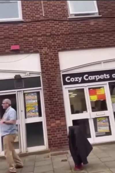 Traffic Warden interrupts high-street nature documentary