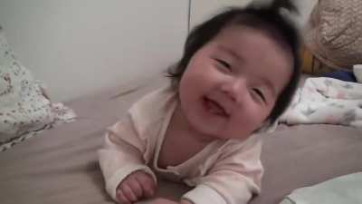 "Wow it's mommy! But I'm sleepy :D"