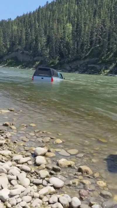 An attempt was made to cross the shallow end of the river, in Alberta Canada