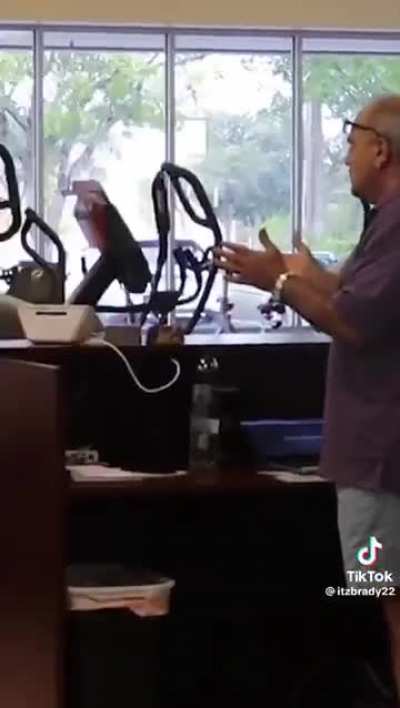 Guy interrupts a shop owner&rsquo;s business with a lame barbell prank