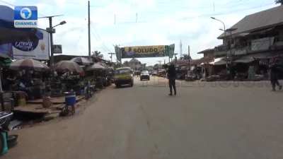 Nigerian security operatives battle gunmen in an open market.