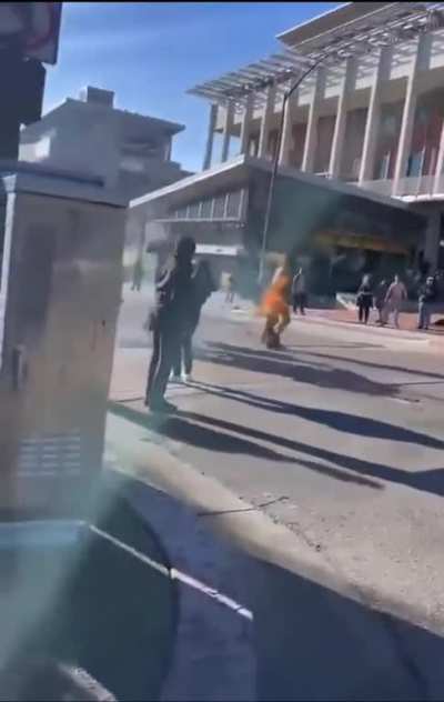 Bystanders try to help man thats on fire