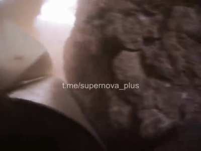 Ukrainian soldiers in a trench get almost a direct hit from TOS-1, this video demonstrates what happens in cases when it doesnt kill you (loss of hearing, nausea, concussion)