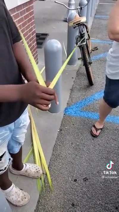 Kid makes roses for people
