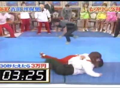 Cool Japanese show "How long can you last with an Olympic gold medalist wrestler" with Saori Yoshida 13x world champion and 4x olympic medalist.