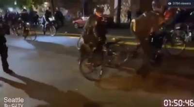 Seattle PD Officer ran over an injured man's head with with his bike.