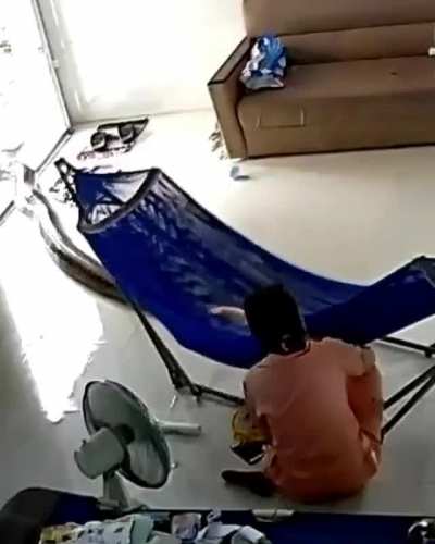 A mother&rsquo;s and a baby&rsquo;s nap disturbed by a large snake
