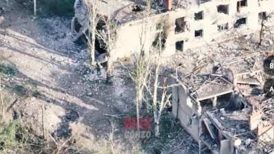 Russian soldiers destroy a Ukranian held position by throwing anti tank mines in it. Netailove, Donetsk region