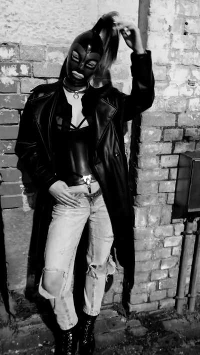 The pet dressed in latex during an evening walk and caught in the chastity belt