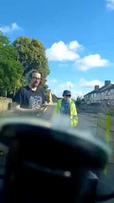 Woman tries to refuse adhering to new '15min City' pilot program in Oxford.