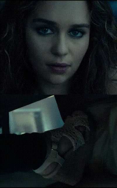 Sassy Emilia Clarke teasing you under the table with her heels. How do you react?