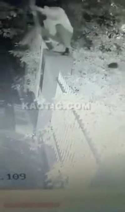 Climbing a fence