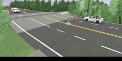 random train nearly crashes into car