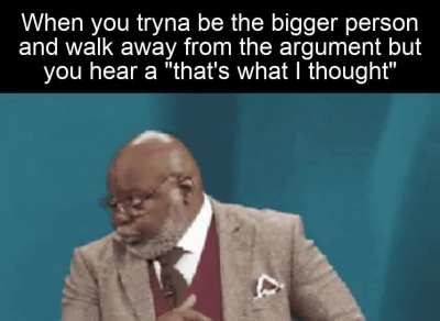 GIF of Man walking away then turning around and glaring over his glasses at whatever's on the left
