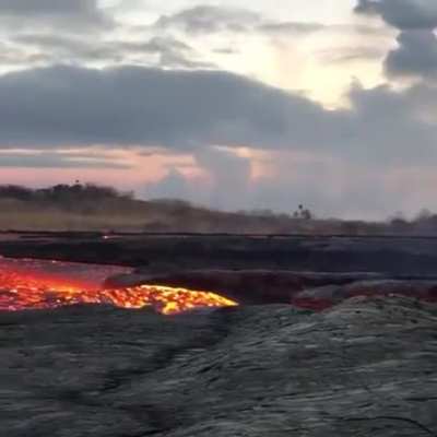 Close up footage of a fast flowing river of lava rushing from Hawaii&rsquo;s Kilauea volcano captured by John Tarson from Epic Lava Tours.