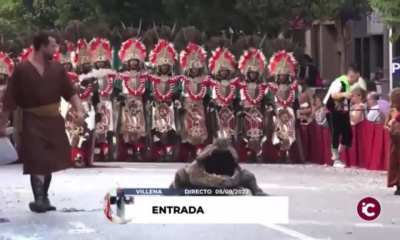 A guy disguised as an alligator in the procession "Moros y Cristianos" festival in Spain.