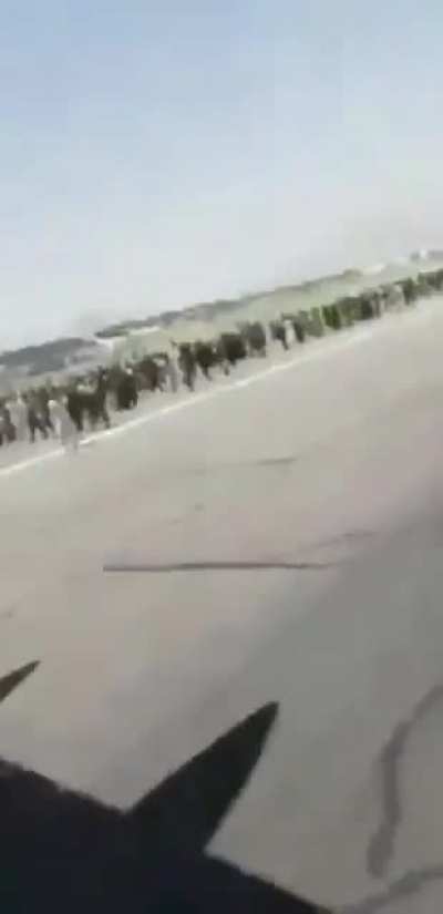 Selfie Angle &mdash; The last moments of men clinging to some parts of the C-17 yesterday