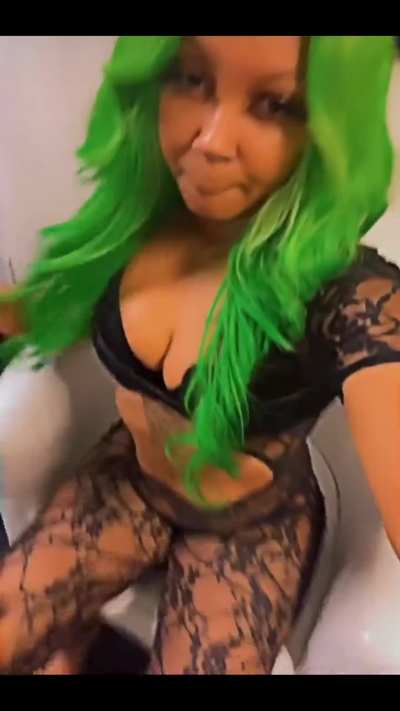 Green doll