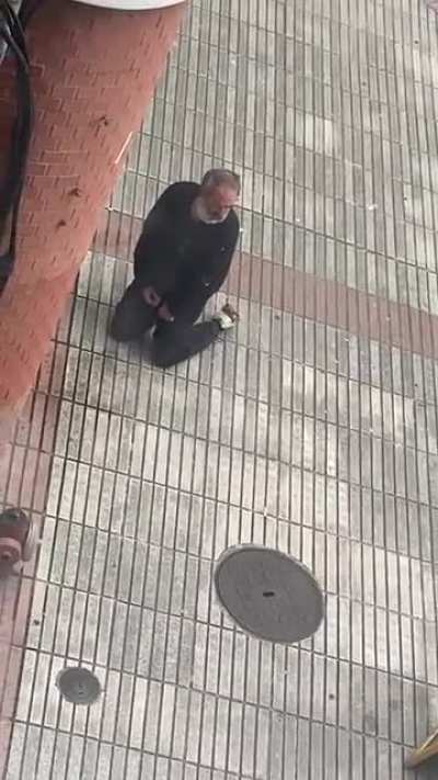 Spain drunken old man. after this he fell asleep next to the piss