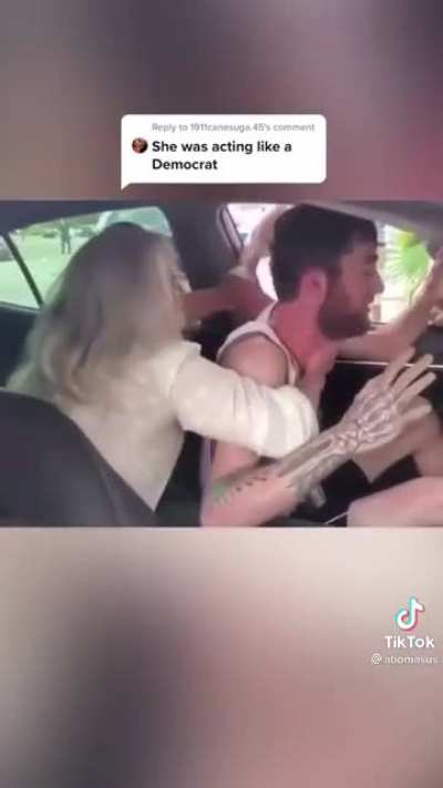 Crazy old lady strangles , claws, and bites an uber driver for NO reason. (Disregard the democrat comment)