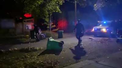 Portland Police clear the residential street trashed by antifa rioters tonight after they smashed up businesses along MLK Blvd.
