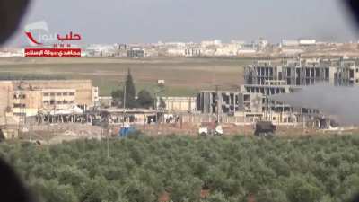 Opposition fighters launch "Katyusha" rockets horizontally at Syrian Army positions around Aleppo Central Prision - 5/21/2013