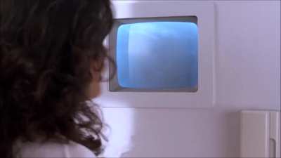 Catherine Zeta-Jones and Louise Downie in the PG-13 movie "Splitting Heirs (1993)"