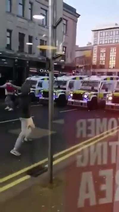 Wee man thinks he can hold back a defender.
