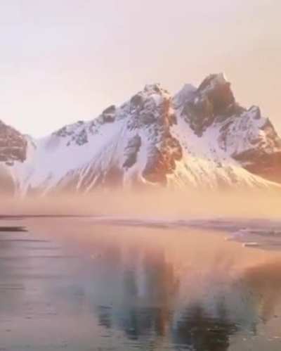 Icy mountains bordering the beach