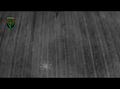 Video of an Aerorozvidka R18 UAV dropping munitions on a Russian BMP - View is from another spotter/chase UAV