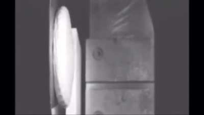 Golf ball hitting a metal plate at 10,000 Frames Per second.