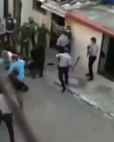 Cuban police (in blue), special forces (all black), and plain-clothes policemen use excessive violence against peaceful protestors on the island.