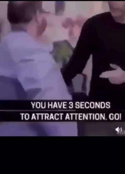 You've spotted a terrorist, now attract attention without letting him know you're attracting attention to him