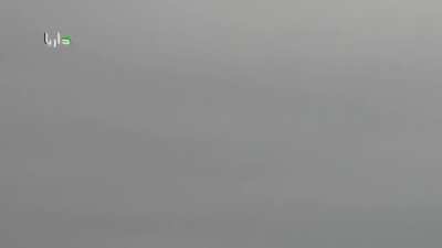 Syrian helicopter drops dumb bombs on top of the cameraman in Daraya - October 2015