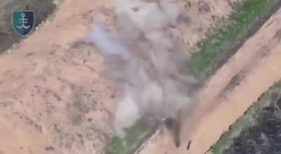Drone footage by the Ukrainian 35th Marine Brigade shows a Russian soldier next to an anti-tank ditch trying to destroy an FPV quad with the stock of his rifle.