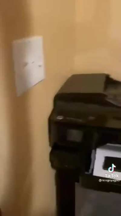 Kid destroys printer for tik tok (also posted a video of him family yelling at him after)