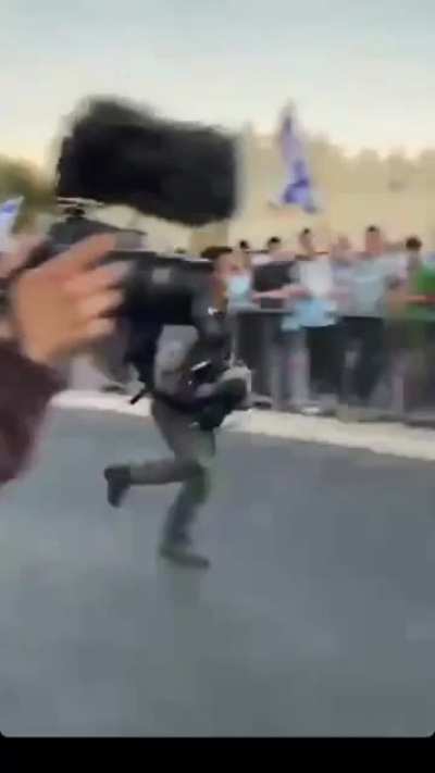 IDFs freaked out by a Palestinian using a broom.. and arrest him!