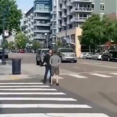 Asian guy defending himself after being harassed